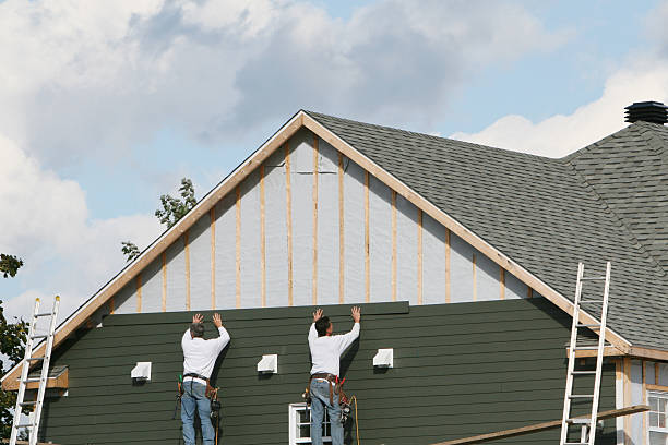 Professional Siding Contractor technician working in Polk City, FL